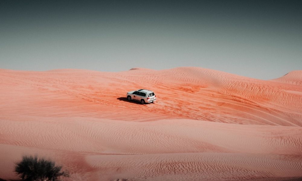 car on sand dunes